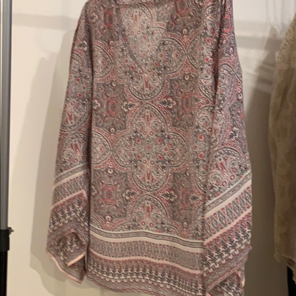 Red , black & white top wit asymmetrical sleeves